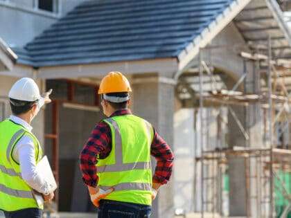 Construction,Engineer,Talks,To,The,Architect,On,The,Construction,Site.